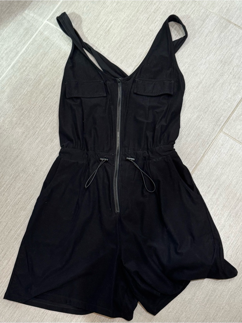 ZYIA Black Sleeveless Zip-Front Romper with Drawcord Waist